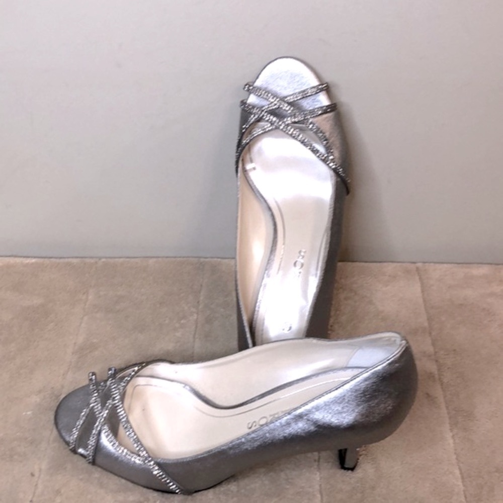 CAPARROS rhinestone pumps